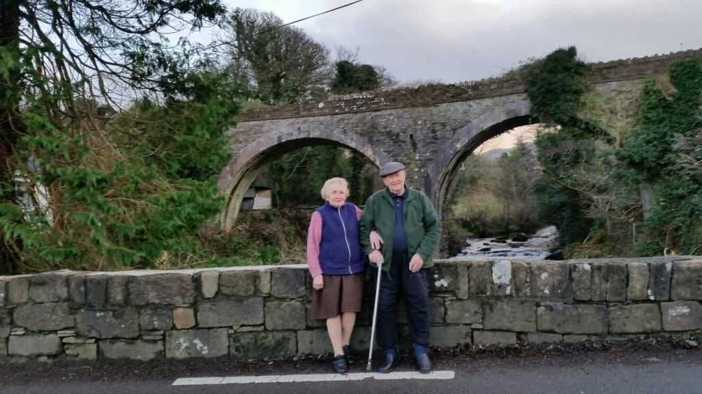 Michael and Mary O’Shea sitting on Curradubh bridge near their home in Camp